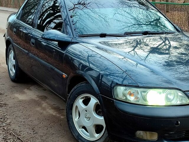 Чорний Опель Вектра, об'ємом двигуна 1.6 л та пробігом 321 тис. км за 2500 $, фото 1 на Automoto.ua