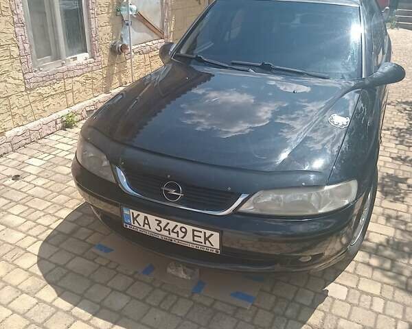 Черный Опель Вектра, объемом двигателя 1.6 л и пробегом 434 тыс. км за 2250 $, фото 1 на Automoto.ua