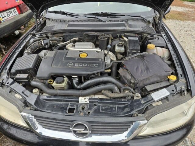 Чорний Опель Вектра, об'ємом двигуна 2 л та пробігом 280 тис. км за 673 $, фото 1 на Automoto.ua