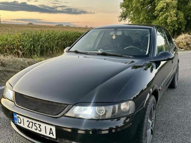 Черный Опель Вектра, объемом двигателя 2 л и пробегом 360 тыс. км за 3100 $, фото 1 на Automoto.ua