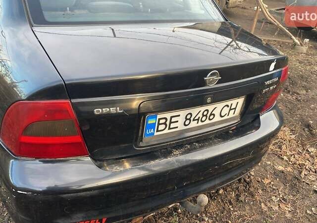Черный Опель Вектра, объемом двигателя 2 л и пробегом 330 тыс. км за 1400 $, фото 1 на Automoto.ua