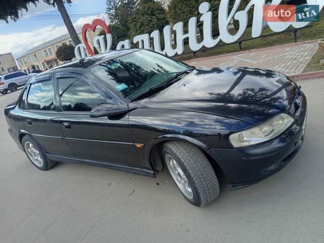 Черный Опель Вектра, объемом двигателя 1.8 л и пробегом 347 тыс. км за 2700 $, фото 1 на Automoto.ua