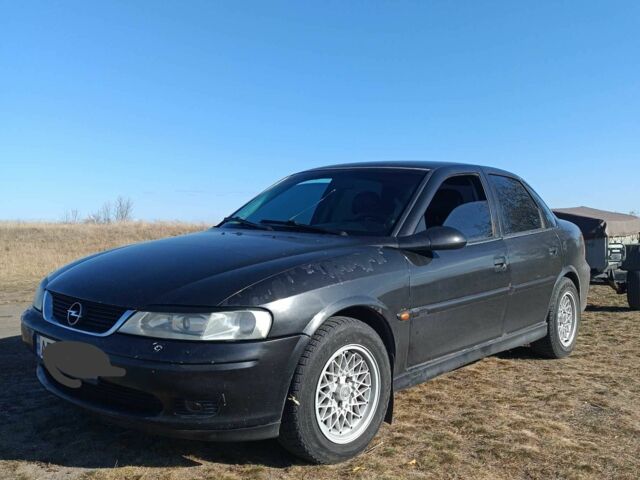 Черный Опель Вектра, объемом двигателя 2 л и пробегом 306 тыс. км за 2000 $, фото 1 на Automoto.ua