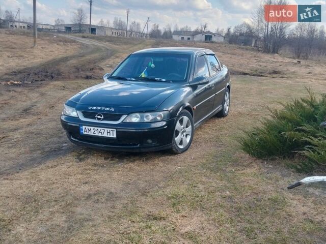 Черный Опель Вектра, объемом двигателя 2.2 л и пробегом 327 тыс. км за 2800 $, фото 1 на Automoto.ua