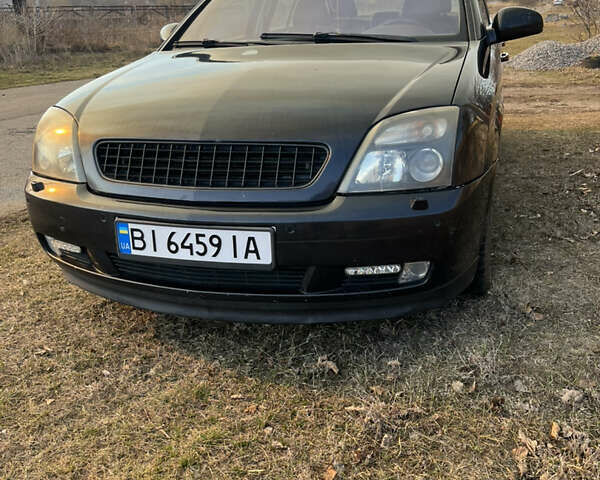 Черный Опель Вектра, объемом двигателя 2.2 л и пробегом 370 тыс. км за 4200 $, фото 1 на Automoto.ua