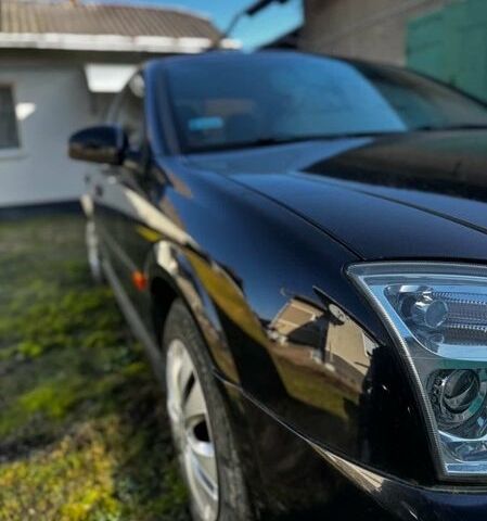 Черный Опель Вектра, объемом двигателя 2 л и пробегом 340 тыс. км за 4000 $, фото 1 на Automoto.ua