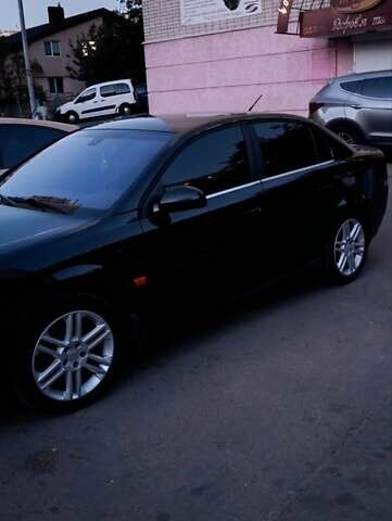 Черный Опель Вектра, объемом двигателя 2.17 л и пробегом 307 тыс. км за 5000 $, фото 1 на Automoto.ua