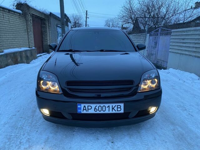 Черный Опель Вектра, объемом двигателя 2.2 л и пробегом 330 тыс. км за 5800 $, фото 1 на Automoto.ua