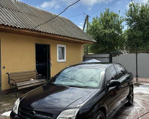 Черный Опель Вектра, объемом двигателя 2.2 л и пробегом 262 тыс. км за 3800 $, фото 1 на Automoto.ua