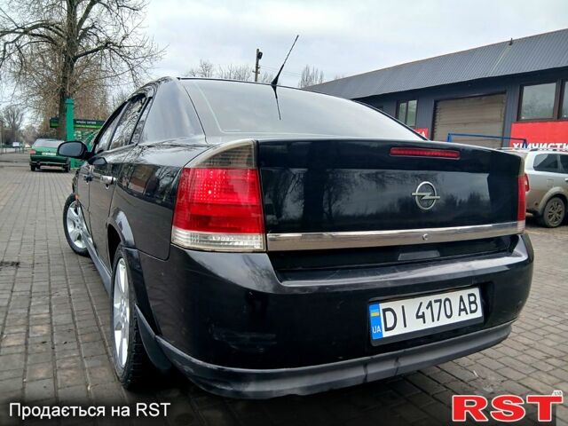 Чорний Опель Вектра, об'ємом двигуна 2.2 л та пробігом 200 тис. км за 3450 $, фото 1 на Automoto.ua