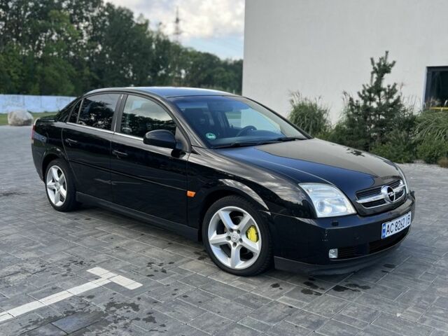 Черный Опель Вектра, объемом двигателя 2.2 л и пробегом 260 тыс. км за 3400 $, фото 1 на Automoto.ua