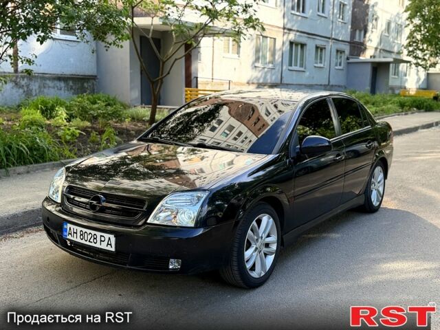 Черный Опель Вектра, объемом двигателя 2.2 л и пробегом 258 тыс. км за 3500 $, фото 1 на Automoto.ua