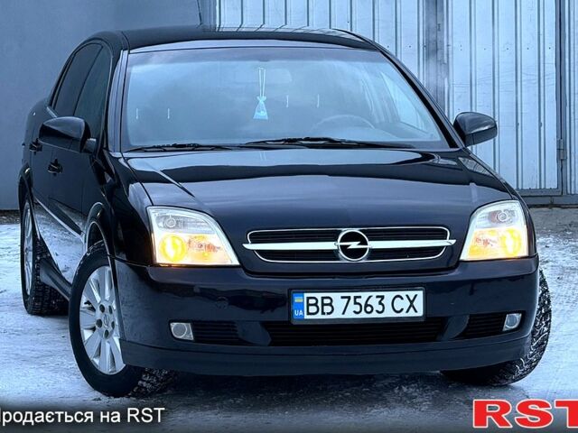 Черный Опель Вектра, объемом двигателя 2.2 л и пробегом 222 тыс. км за 3999 $, фото 1 на Automoto.ua