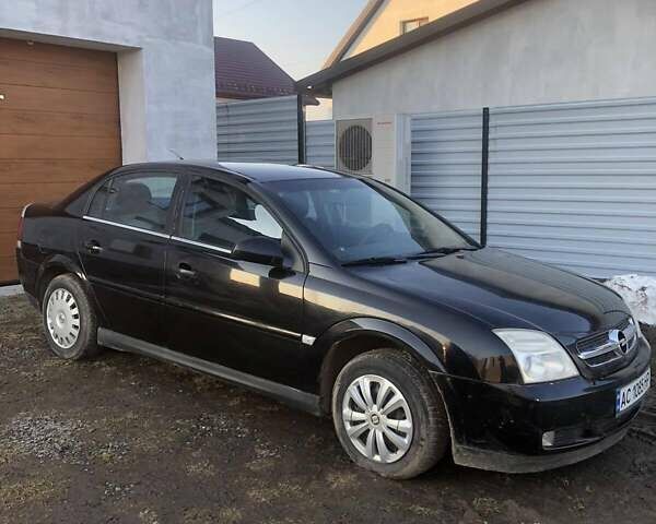 Черный Опель Вектра, объемом двигателя 2.2 л и пробегом 300 тыс. км за 3450 $, фото 1 на Automoto.ua