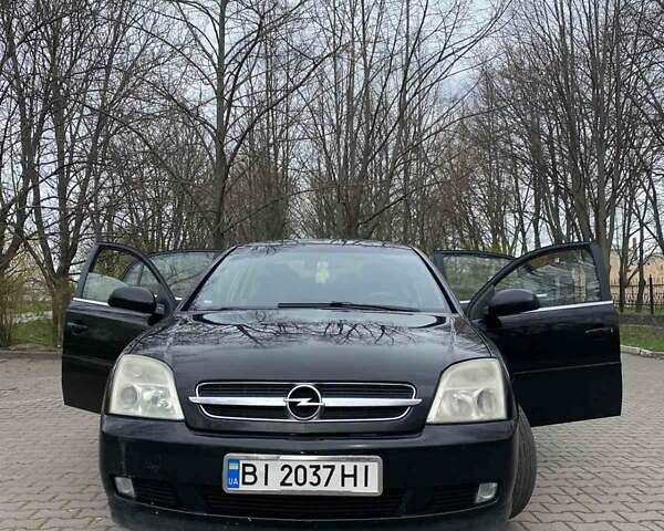 Черный Опель Вектра, объемом двигателя 2.2 л и пробегом 128 тыс. км за 4000 $, фото 1 на Automoto.ua