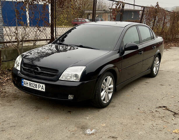 Черный Опель Вектра, объемом двигателя 2.2 л и пробегом 240 тыс. км за 3600 $, фото 1 на Automoto.ua