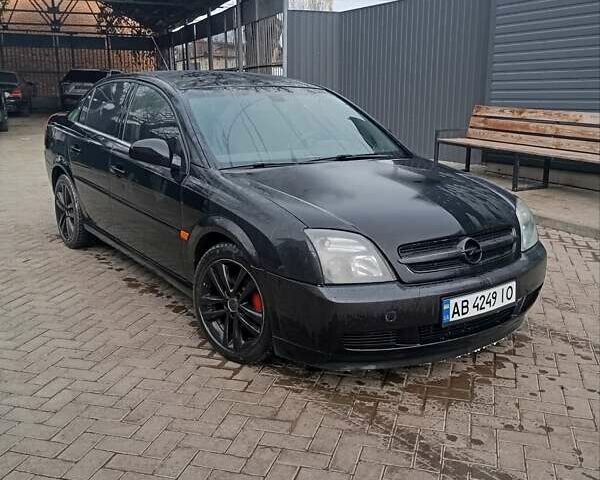Черный Опель Вектра, объемом двигателя 2.2 л и пробегом 300 тыс. км за 3000 $, фото 1 на Automoto.ua