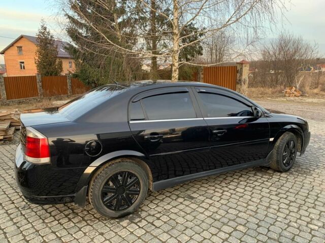 Черный Опель Вектра, объемом двигателя 2.2 л и пробегом 249 тыс. км за 5100 $, фото 1 на Automoto.ua