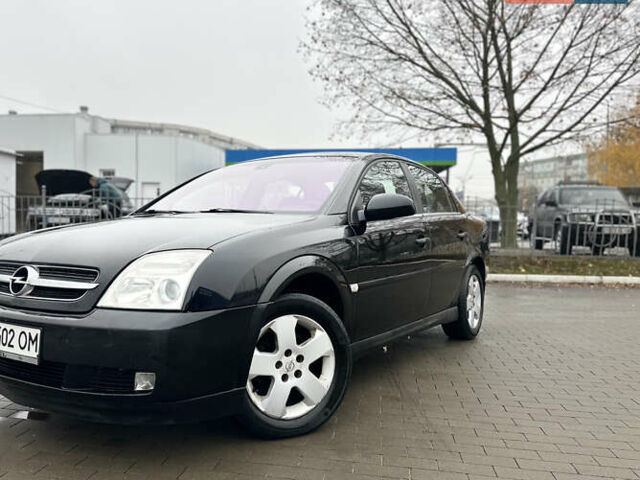 Черный Опель Вектра, объемом двигателя 2.2 л и пробегом 238 тыс. км за 3899 $, фото 1 на Automoto.ua