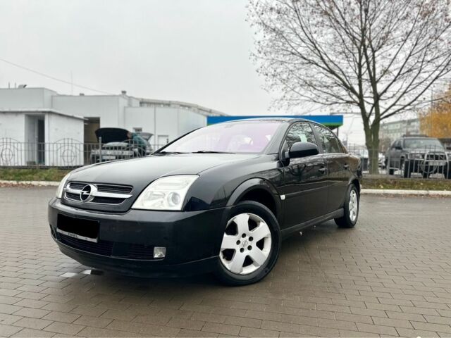 Черный Опель Вектра, объемом двигателя 2.2 л и пробегом 238 тыс. км за 3999 $, фото 1 на Automoto.ua