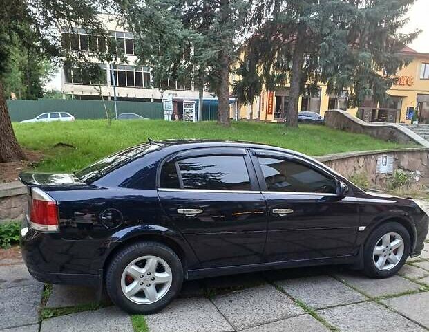 Черный Опель Вектра, объемом двигателя 1.9 л и пробегом 265 тыс. км за 5350 $, фото 1 на Automoto.ua