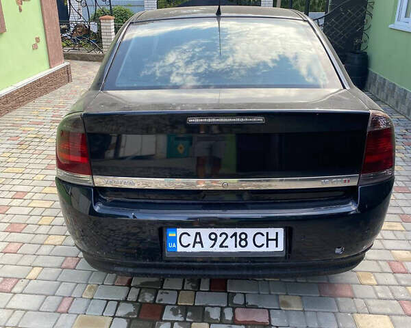 Черный Опель Вектра, объемом двигателя 1.9 л и пробегом 273 тыс. км за 5200 $, фото 1 на Automoto.ua