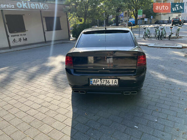 Черный Опель Вектра, объемом двигателя 2.2 л и пробегом 235 тыс. км за 6200 $, фото 1 на Automoto.ua