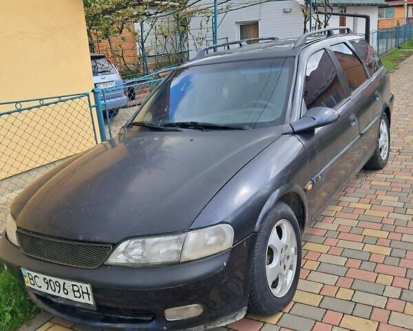 Черный Опель Вектра, объемом двигателя 2.5 л и пробегом 300 тыс. км за 1150 $, фото 1 на Automoto.ua