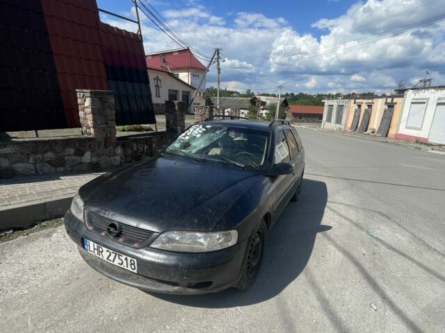 Черный Опель Вектра, объемом двигателя 2 л и пробегом 400 тыс. км за 600 $, фото 1 на Automoto.ua