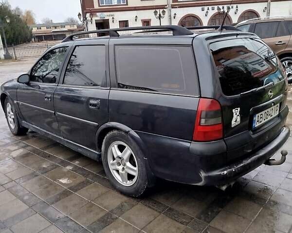 Черный Опель Вектра, объемом двигателя 2.5 л и пробегом 350 тыс. км за 3000 $, фото 1 на Automoto.ua