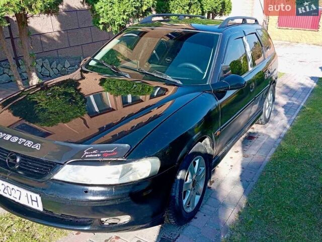 Чорний Опель Вектра, об'ємом двигуна 2 л та пробігом 325 тис. км за 2500 $, фото 1 на Automoto.ua