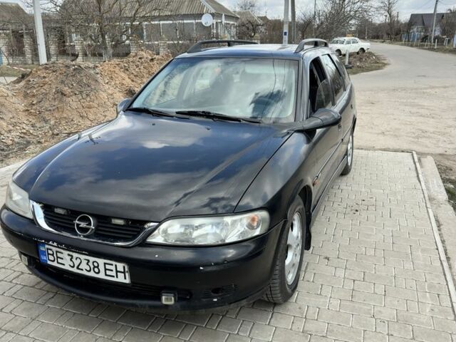 Черный Опель Вектра, объемом двигателя 1.8 л и пробегом 370 тыс. км за 1800 $, фото 1 на Automoto.ua