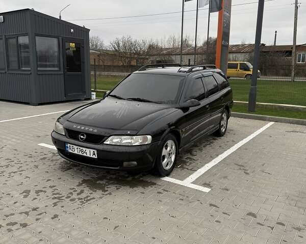Черный Опель Вектра, объемом двигателя 2 л и пробегом 355 тыс. км за 3600 $, фото 1 на Automoto.ua