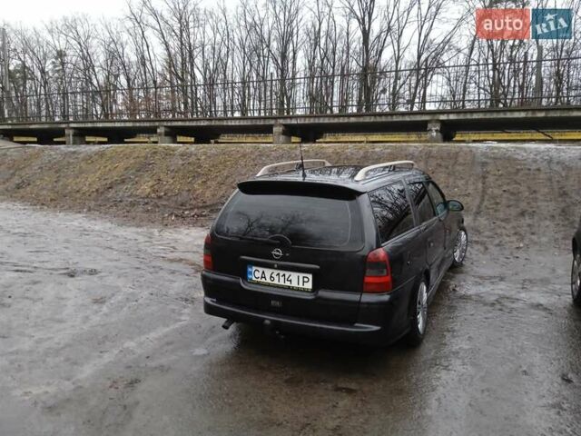Черный Опель Вектра, объемом двигателя 2 л и пробегом 400 тыс. км за 3500 $, фото 1 на Automoto.ua