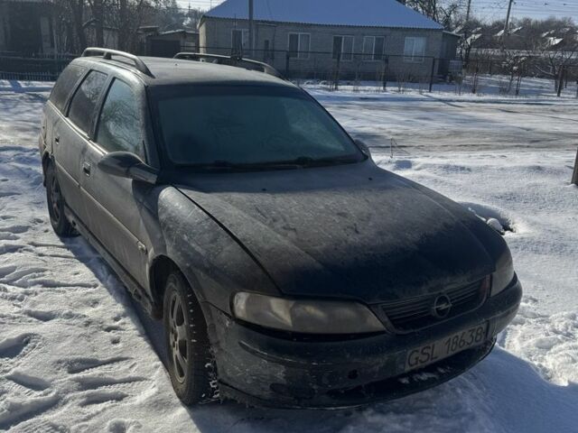 Черный Опель Вектра, объемом двигателя 2 л и пробегом 350 тыс. км за 1550 $, фото 1 на Automoto.ua
