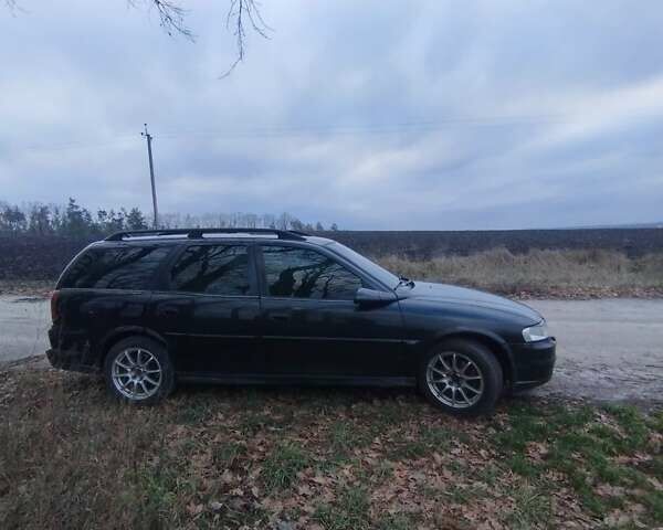 Черный Опель Вектра, объемом двигателя 2.2 л и пробегом 400 тыс. км за 2500 $, фото 1 на Automoto.ua