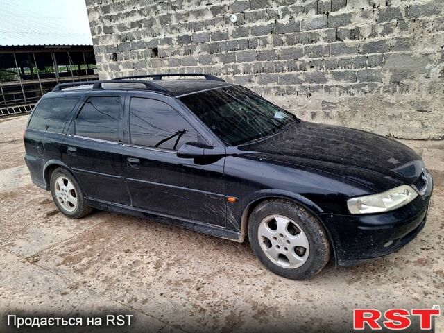 Черный Опель Вектра, объемом двигателя 2 л и пробегом 390 тыс. км за 2700 $, фото 1 на Automoto.ua