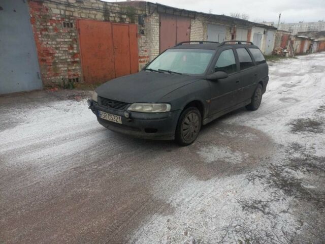 Чорний Опель Вектра, об'ємом двигуна 2 л та пробігом 330 тис. км за 1400 $, фото 1 на Automoto.ua