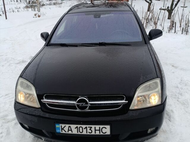 Черный Опель Вектра, объемом двигателя 2.2 л и пробегом 310 тыс. км за 3750 $, фото 1 на Automoto.ua