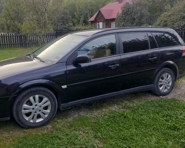 Черный Опель Вектра, объемом двигателя 2 л и пробегом 340 тыс. км за 3300 $, фото 1 на Automoto.ua