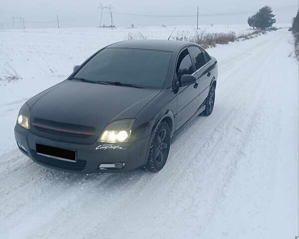 Черный Опель Вектра, объемом двигателя 2.2 л и пробегом 375 тыс. км за 5200 $, фото 1 на Automoto.ua