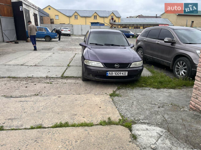 Фиолетовый Опель Вектра, объемом двигателя 2 л и пробегом 309 тыс. км за 2550 $, фото 1 на Automoto.ua
