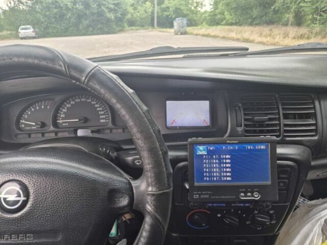 Фиолетовый Опель Вектра, объемом двигателя 2 л и пробегом 410 тыс. км за 2700 $, фото 1 на Automoto.ua