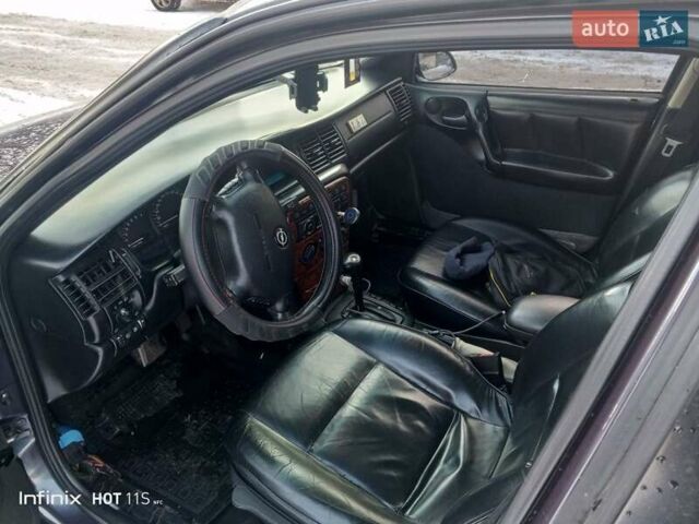 Фіолетовий Опель Вектра, об'ємом двигуна 2 л та пробігом 345 тис. км за 1600 $, фото 1 на Automoto.ua