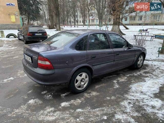 Фиолетовый Опель Вектра, объемом двигателя 1.6 л и пробегом 400 тыс. км за 1950 $, фото 1 на Automoto.ua