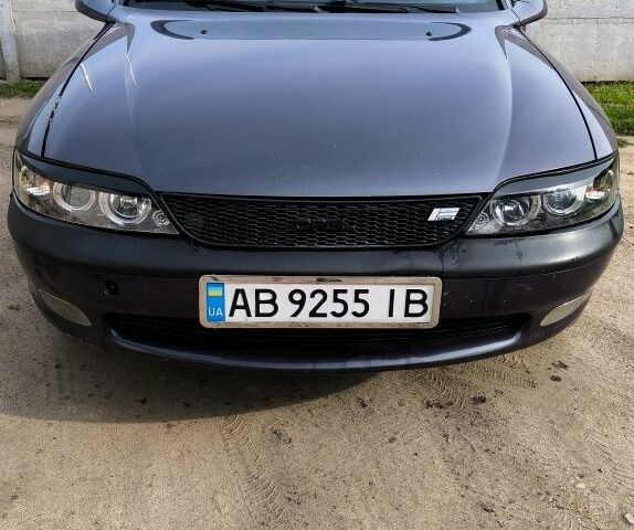 Фіолетовий Опель Вектра, об'ємом двигуна 1.8 л та пробігом 300 тис. км за 1400 $, фото 1 на Automoto.ua