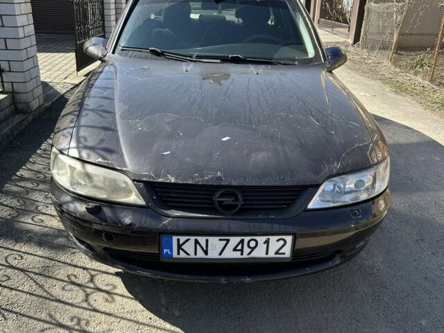 Коричневый Опель Вектра, объемом двигателя 2 л и пробегом 256 тыс. км за 600 $, фото 1 на Automoto.ua
