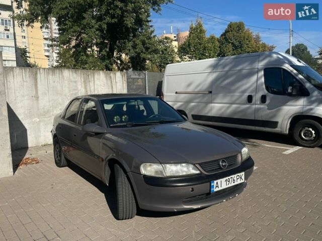 Коричневый Опель Вектра, объемом двигателя 2 л и пробегом 403 тыс. км за 2400 $, фото 1 на Automoto.ua