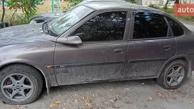 Коричневый Опель Вектра, объемом двигателя 2 л и пробегом 200 тыс. км за 1700 $, фото 1 на Automoto.ua
