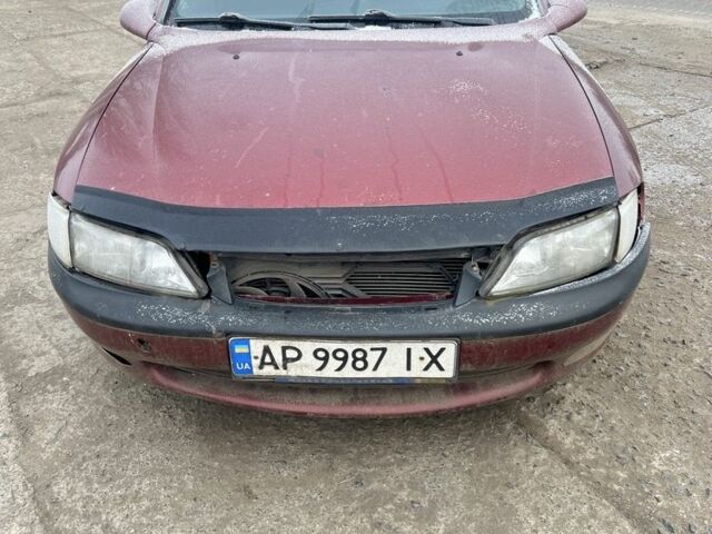 Червоний Опель Вектра, об'ємом двигуна 2.5 л та пробігом 300 тис. км за 2364 $, фото 1 на Automoto.ua